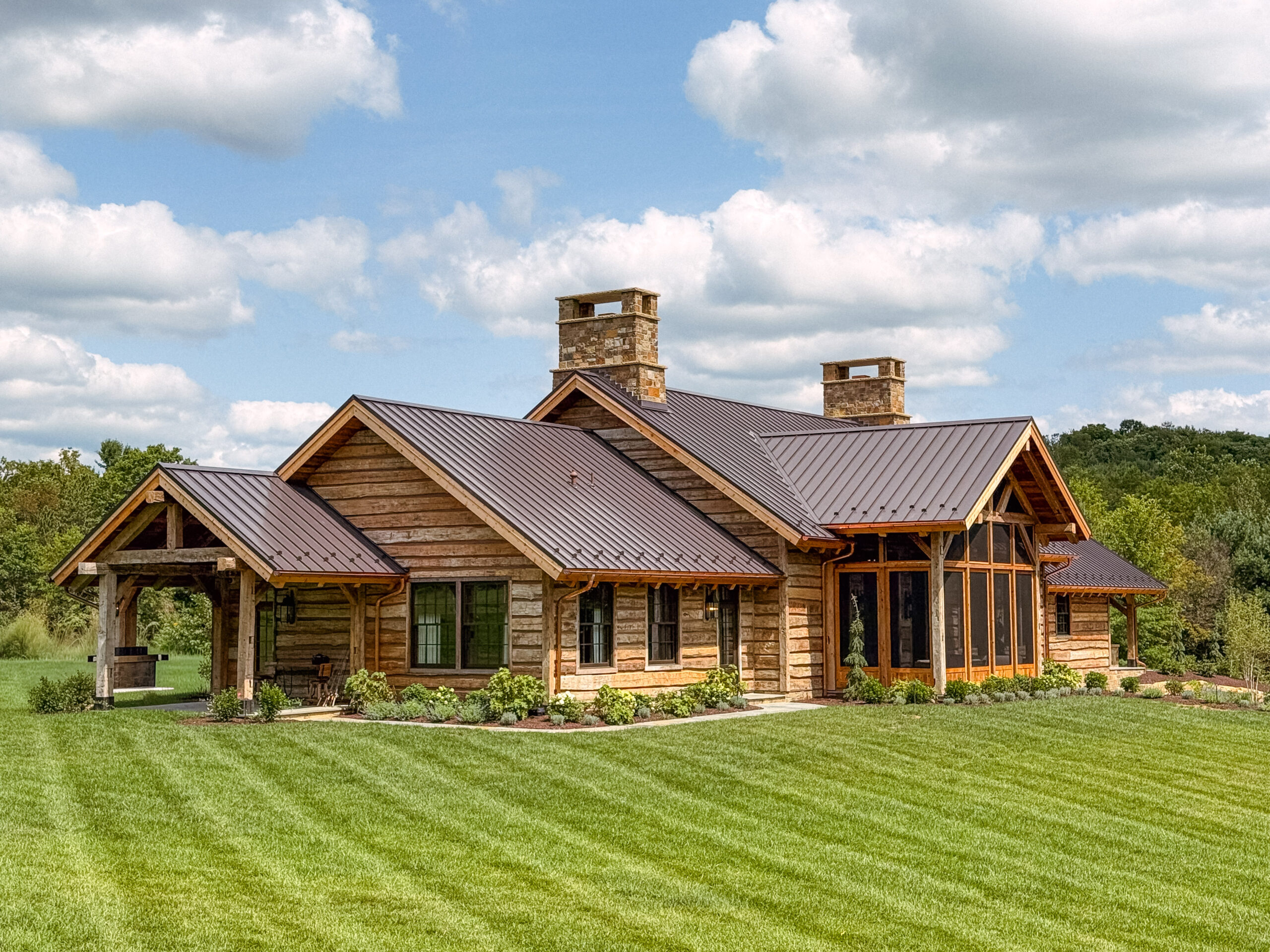 Custom Timber Frame Home with Log Skins as siding